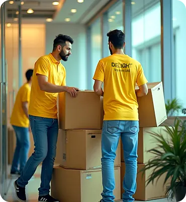 Office movers carrying boxes during an office relocation in Abu Dhabi