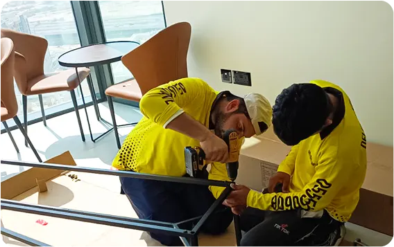 Delight movers dismantling and assembling furniture
